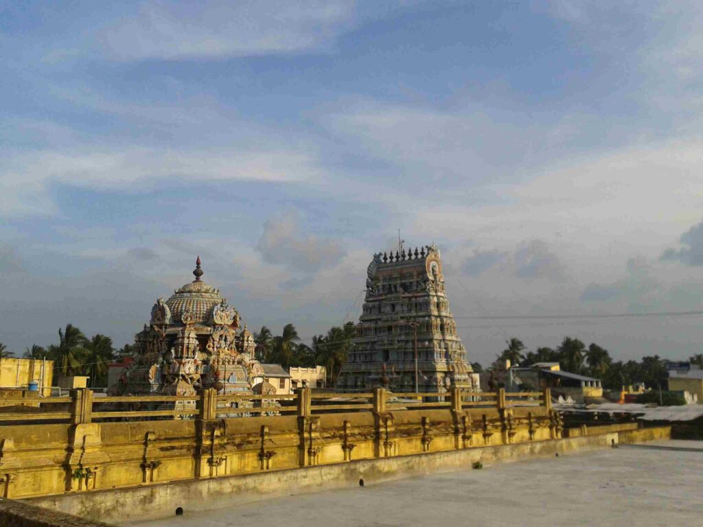 Swamimalai Temple, one of the revered Arupadai Veedu Murugan Temples, is nestled atop a small hill. This sacred site is surrounded by lush greenery and offers a serene atmosphere for devotees. The temple structure, with its intricate architecture, stands majestically, inviting visitors to experience its divine presence and spiritual significance.